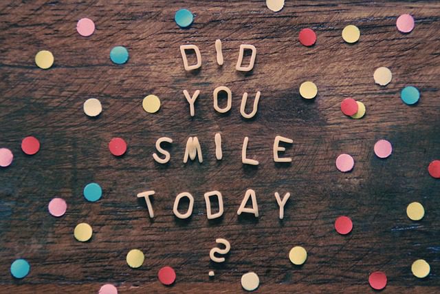 'Did You Smile Today' Spelled out on a wooden surface with polka dots